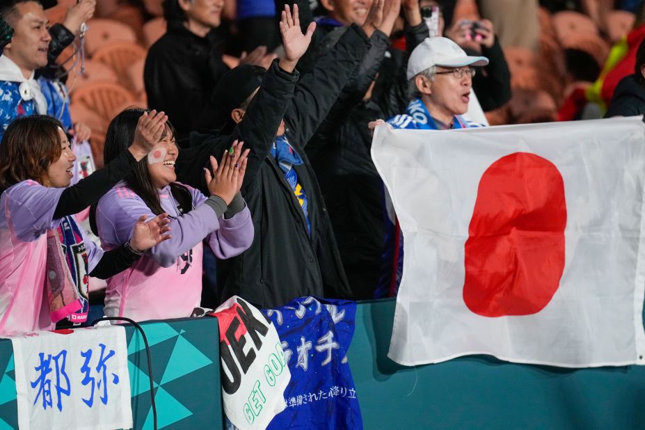 Japan supporters react following their team's emphatic victory over Zambia.