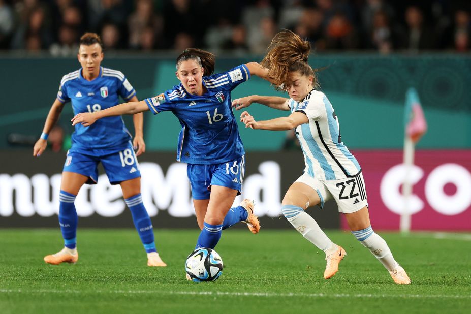 Italy's Giulia Dragoni is challenged by Estefania Banini of Argentina. At the age of 16, Dragoni became the <a href="https://edition.cnn.com/2023/07/24/football/giulia-dragoni-italy-argentina-womens-world-cup-spt-intl/index.html" target="_blank">youngest player</a> to represent Italy in the competition's history.