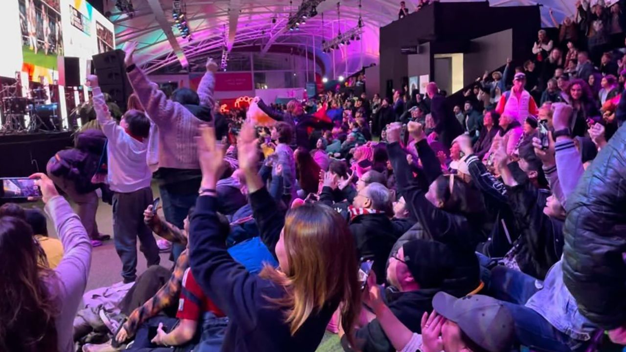 Philippines fans celebrate their team's goal against New Zealand at the 2023 Women's World Cup in a FIFA fan park in Auckland, New Zealand.