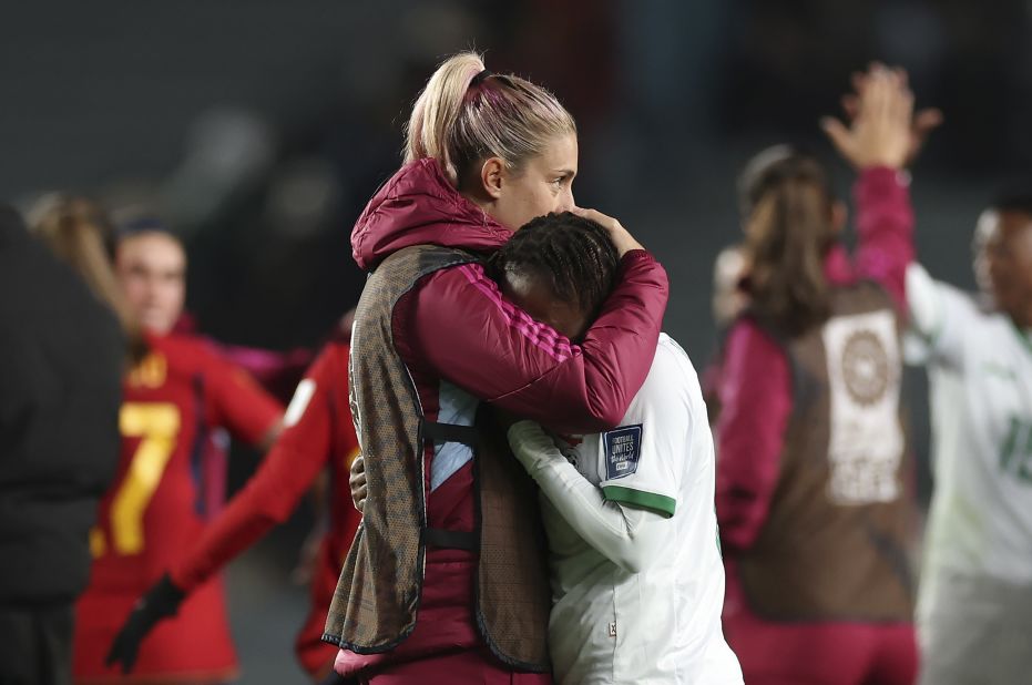 Spain's Alexia Putellas consoles Zambia's Mary Wilombe after the match. Zambia still has one match to play, but it will not be able to advance to the knockout stage.