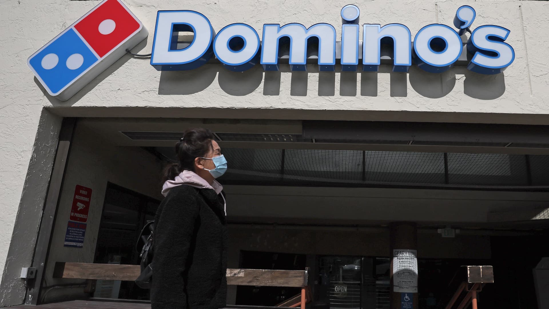 Stocks making the biggest moves midday: Domino’s Pizza, DraftKings, Lucid, SunPower and more