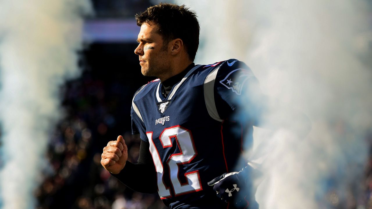 FOXBOROUGH, MA - DECEMBER 29: Tom Brady #12 of the New England Patriots runs onto the field before a game against the Miami Dolphins at Gillette Stadium on December 29, 2019 in Foxborough, Massachusetts. (Photo by Billie Weiss/Getty Images)