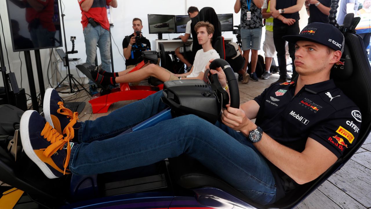 BUDAPEST, HUNGARY - MAY 01: Max Verstappen of Netherlands and Red Bull Racing on a racing simulator during the Red Bull Racing Budapest Showrun on May 1, 2018 in Budapest, Hungary.