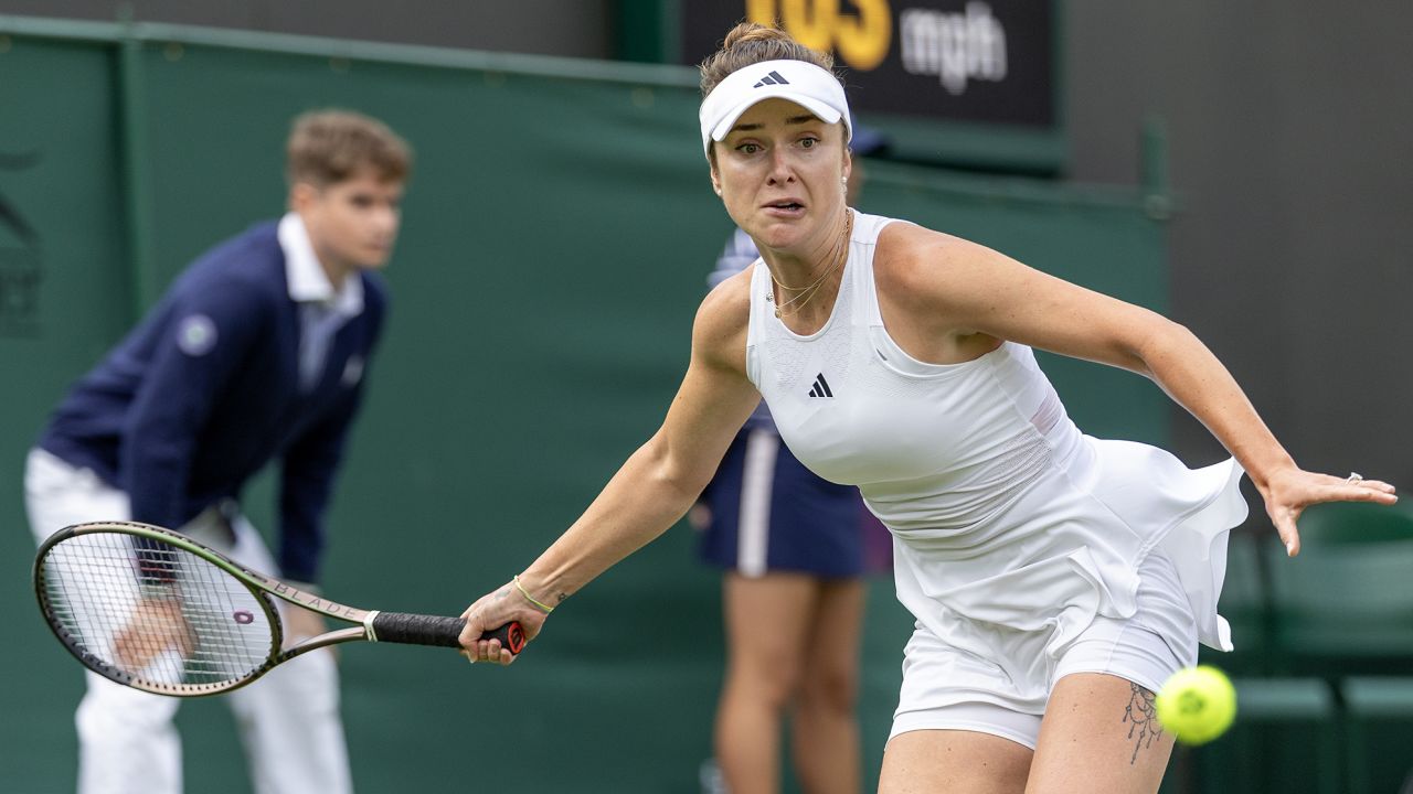 LONDON, ENGLAND - JULY 6.   Elina Svitolina of Ukraine in action against Elise Mertens of Belgium in the Ladies' Singles second-round match on Court Two during the Wimbledon Lawn Tennis Championships at the All England Lawn Tennis and Croquet Club at Wimbledon on July 06, 2023, in London, England. (Photo by Tim Clayton/Corbis via Getty Images)