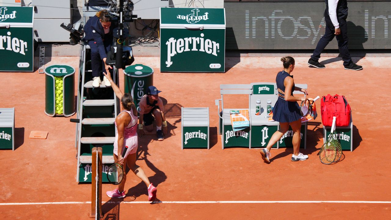 Marta Kostyuk walks straight off court following defeat to Aryna Sabalenka at the French Open.