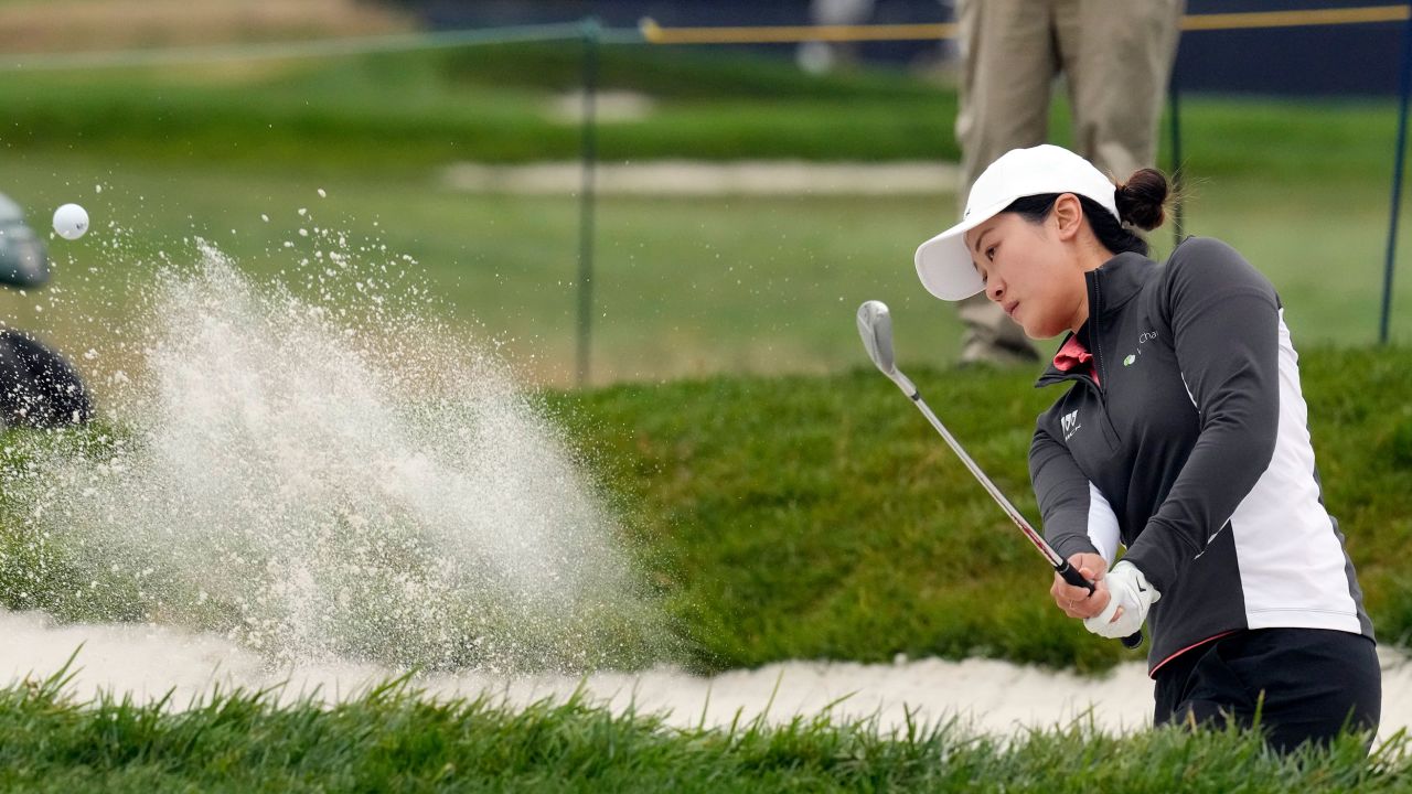 Xiyu Janet Lin, of China, hits out of a bunker to the 11th green during the first round of the U.S. Women's Open golf tournament at the Pebble Beach Golf Links, Thursday, July 6, 2023, in Pebble Beach, Calif. (AP Photo/Godofredo A. Vásquez)