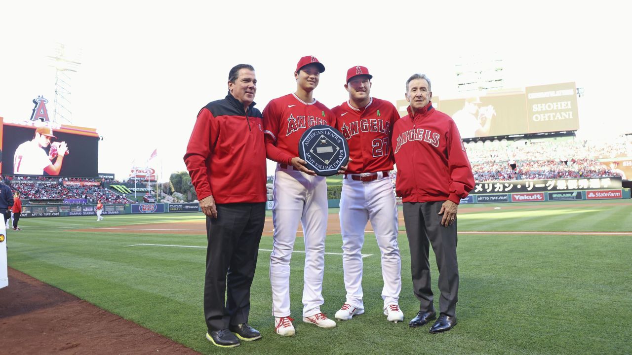 Los Angeles Angels two-way player Shohei Ohtani (2nd from L) poses for a photo with three-time MVP outfielder Mike Trout (2nd from R) during a pregame ceremony to honor his 2021 American League MVP award at Angel Stadium in Anaheim, California, on May 10, 2022. (Pool photo) (Photo by Kyodo News via Getty Images)