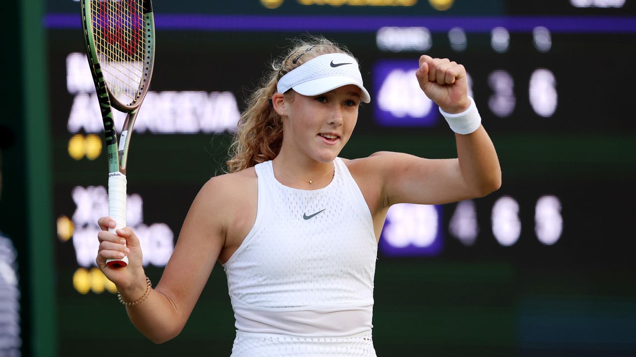 LONDON, ENGLAND - JULY 05: Mirra Andreeva celebrates winning match point against Xiyu Wang of People's Republic of China in the Women's Singles first round match during day three of The Championships Wimbledon 2023 at All England Lawn Tennis and Croquet Club on July 05, 2023 in London, England. (Photo by Clive Brunskill/Getty Images)