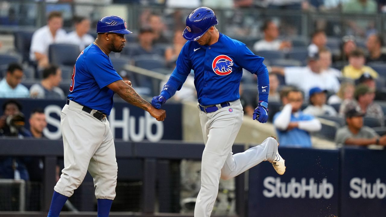 Chicago Cubs' Cody Bellinger, right, celebrates with third base coach Willie Harris as he runs the bases after hitting a home run during the third inning of a baseball game against the New York Yankees, Friday, July 7, 2023, in New York.