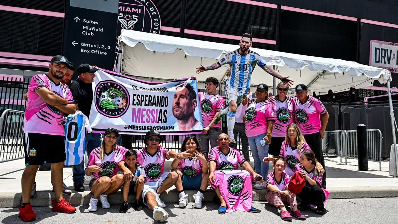 Fans of Argentina's Lionel Messi wait for his arrival at the DRV PNK Stadium in Fort Lauderdale, Florida on July 11, 2023, ahead of his debut in the Major League Soccer (MLS) with Inter Miami. Messi landed in Florida on Tuesday ahead of putting the final touches on his move to US Major League Soccer club Inter Miami, ESPN television footage showed. Inter Miami announced July 7, 2023, it will hold a presentation event called 'The Unveil' on July 16 at its home stadium. Messi said last month that he was moving to the MLS club after allowing his contract at Paris Saint-Germain to run out. (Photo by CHANDAN KHANNA / AFP) (Photo by CHANDAN KHANNA/AFP via Getty Images)