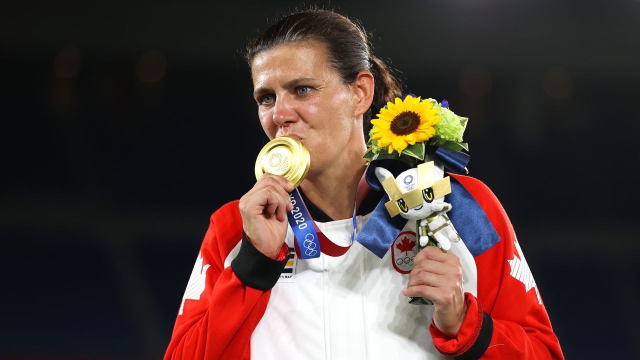 Christine Sinclair poses with her gold medal after Canada had won women's football competition at the Tokyo 2020 Olympic Games.