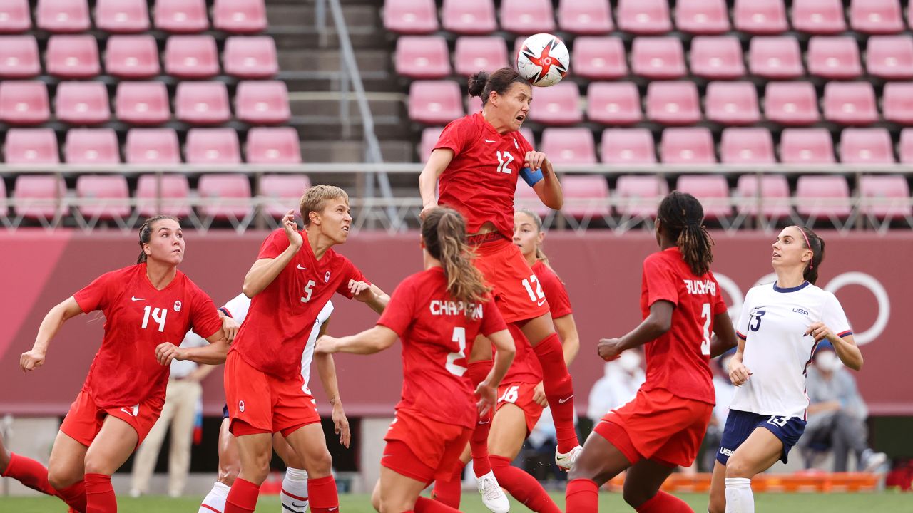 KASHIMA, JAPAN - AUGUST 02: Christine Sinclair #12 of Team Canada wins a header during the Women's Semi-Final match between USA and Canada on day ten of the Tokyo Olympic Games at Kashima Stadium on August 02, 2021 in Kashima, Ibaraki, Japan. (Photo by Atsushi Tomura/Getty Images)