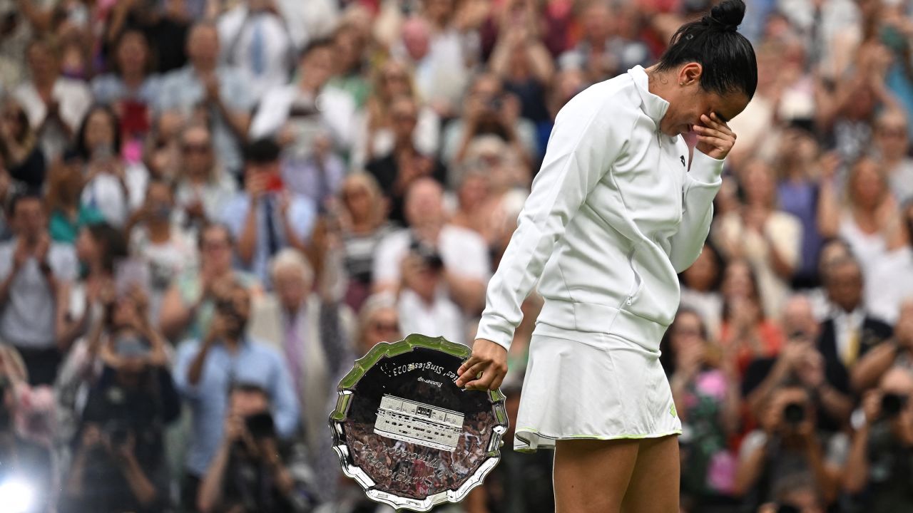 Tennis - Wimbledon - All England Lawn Tennis and Croquet Club, London, Britain - July 15, 2023
Tunisia's Ons Jabeur with the runners up trophy after losing her final match against Czech Republic's Marketa Vondrousova.