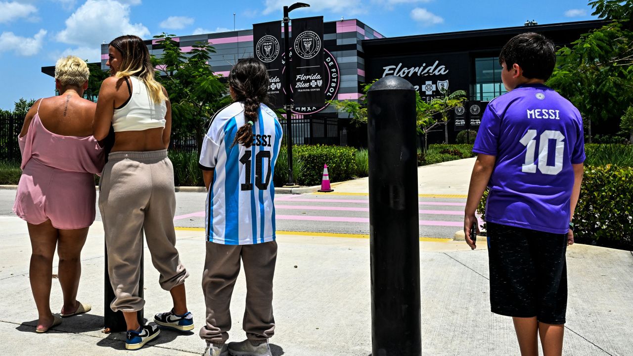 Fans of Argentine football player Lionel Messi wait for his arrival at the DRV PNK Stadium in Fort Lauderdale, Florida, on July 11, 2023, ahead of Messi's debut in the Major League Soccer (MLS) with Inter Miami. Messi landed in Florida on Tuesday ahead of putting the final touches on his move to US Major League Soccer club Inter Miami, ESPN television footage showed. Inter Miami announced July 7, 2023, it will hold a presentation event called 'The Unveil' on July 16 at its home stadium. Messi said last month that he was moving to the MLS club after allowing his contract at Paris Saint-Germain to run out.