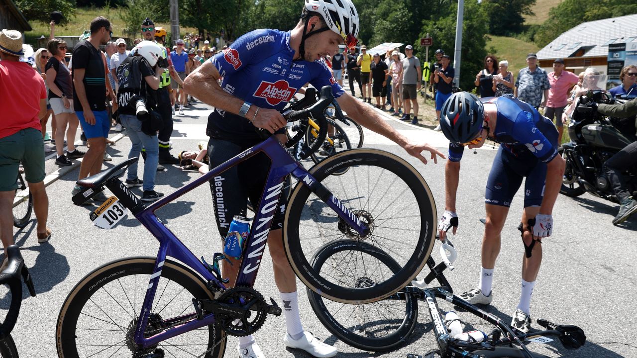 Cycling - Tour de France - Stage 15 - Les Gets Les Portes Du Soleil to Saint-Gervais Mont-Blanc - France - July 16, 2023
Alpecin--Deceuninck's Michael Gogl and Groupama--FDJ's Lars van den Berg after a crash during stage 15