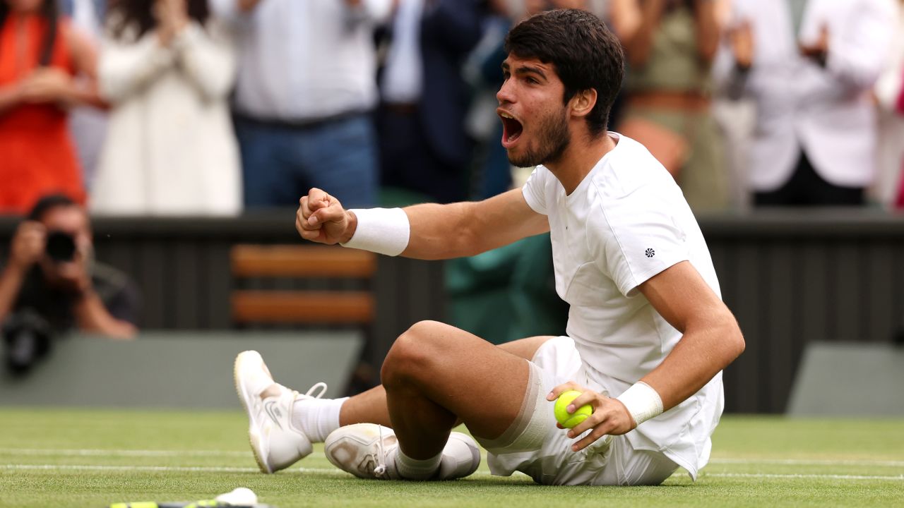 Carlos Alcaraz of Spain celebrates winning Championship Point during the Men's Singles Final against Novak Djokovic of Serbia on day fourteen of The Championships Wimbledon 2023 at All England Lawn Tennis and Croquet Club on July 16, 2023 in London, England.