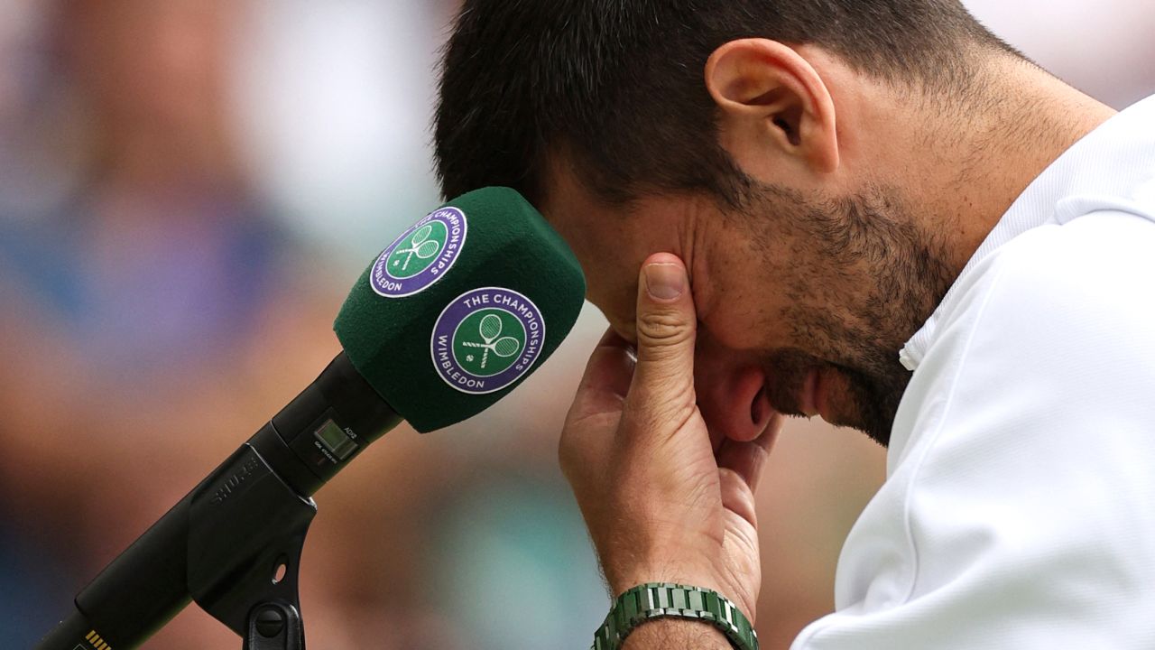 Serbia's Novak Djokovic reacts as he speaks to the crowd after being defeated by Spain's Carlos Alcaraz during their men's singles final tennis match on the last day of the 2023 Wimbledon Championships at The All England Tennis Club in Wimbledon, southwest London, on July 16, 2023.