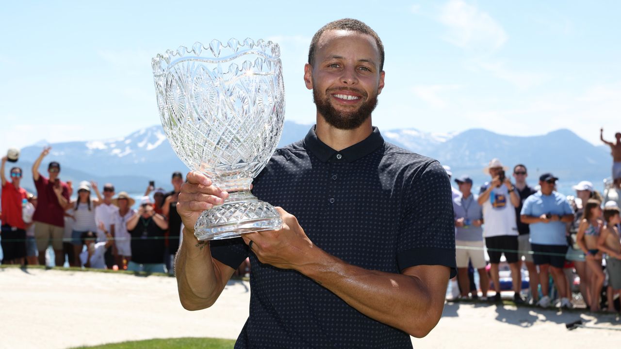 STATELINE, NEVADA - JULY 16: Stephen Curry of the NBA Golden State Warriors holds the trophy after winning the American Century Championship on Day Three of the 2023 American Century Championship at Edgewood Tahoe Golf Course on July 16, 2023 in Stateline, Nevada. (Photo by Isaiah Vazquez/Getty Images)