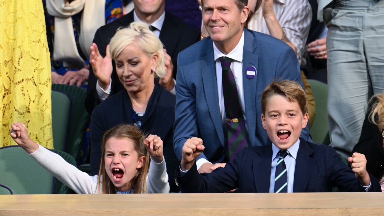 Charlotte and George cheer emphatically as they watch the epic men's finale of the prestigious tennis tournament.