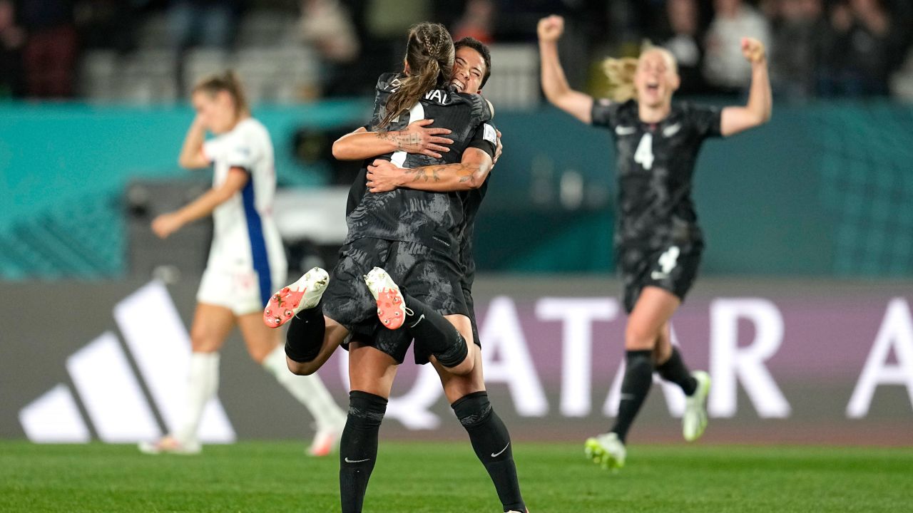 New Zealand's Ria Percival and Ali Riley celebrate their victory.