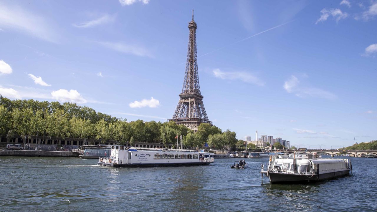 An empty boat travels the River Seine during the technical test event last week for the Paris 2024 opening ceremony.