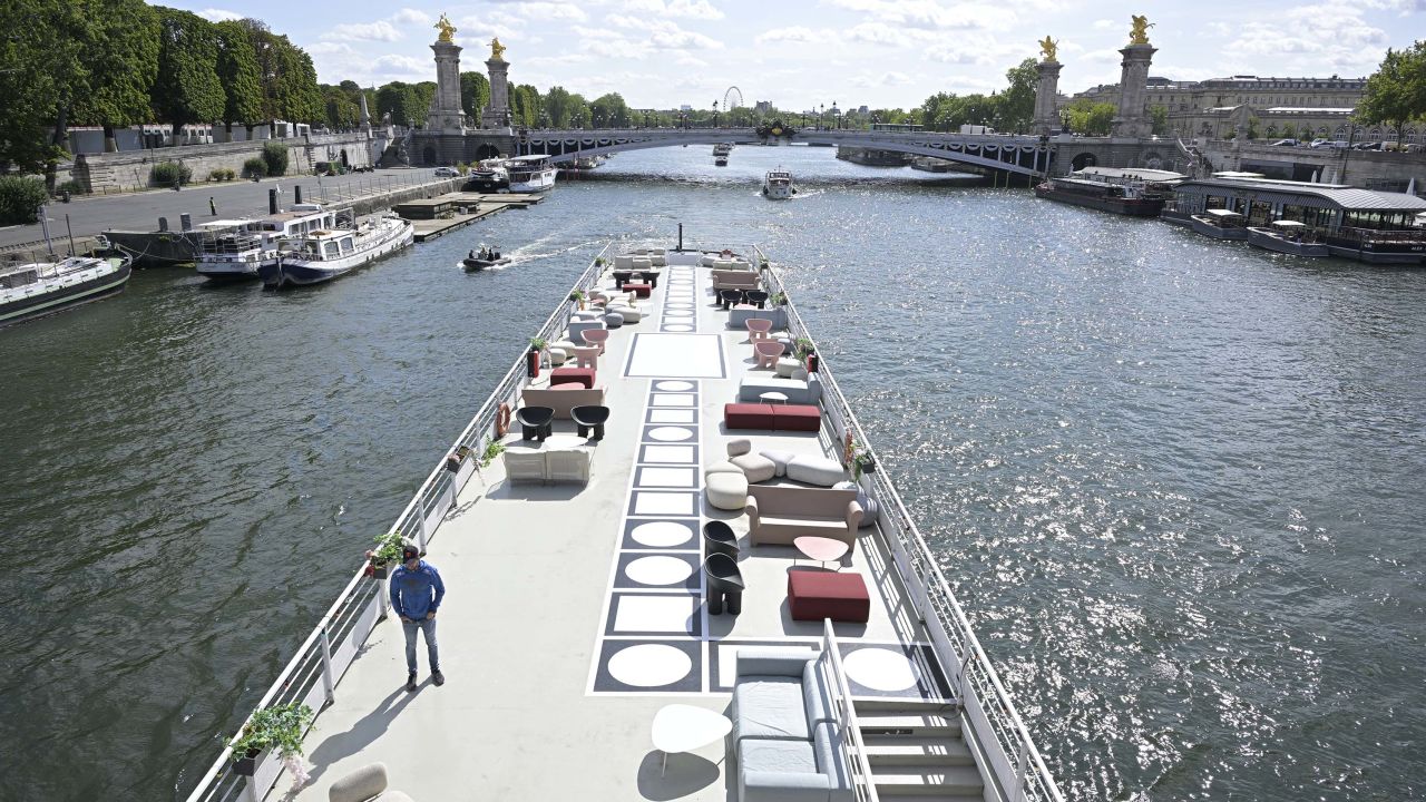 A boat passes the Alexandre III bridge during an opening ceremony test event.