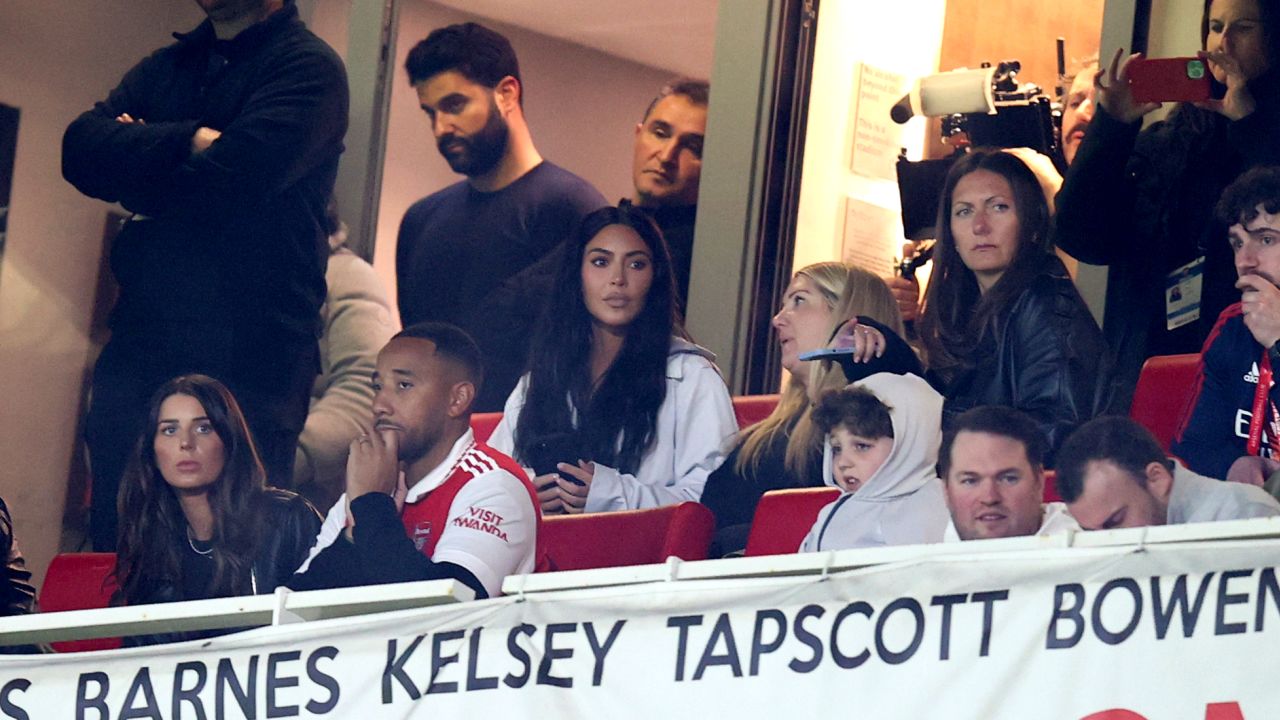 Kim Kardashian watches the match from the stands during the UEFA Europa League round of 16 leg two match between Arsenal  FC and Sporting CP at Emirates Stadium on March 16, 2023 in London, United Kingdom.