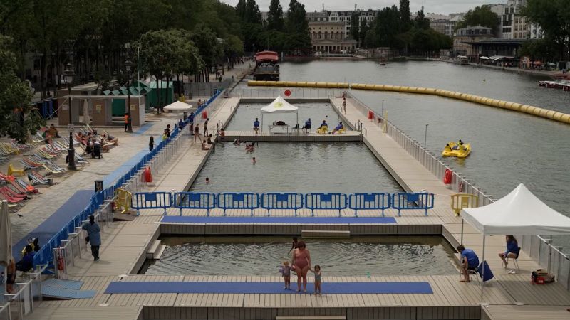 Paris is cleaning up the Seine to bring back swimming events. See how it’s going