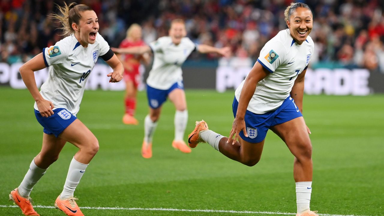 James and her teammates celebrates England's goal against Denmark.