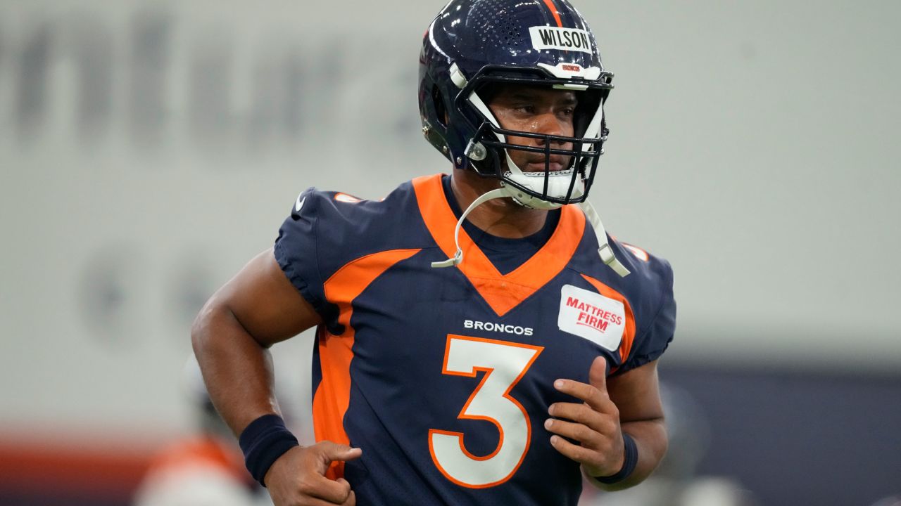 FILE - Denver Broncos quarterback Russell Wilson (3) takes part in drills during a mandatory NFL football minicamp at the Broncos' headquarters Tuesday, June 13, 2023, in Centennial, Colo. Sean Payton is back on the sideline and this time it's in Denver. The former Saints head coach was hired after spending a year in the broadcast booth. His task is to replicate the success he had with Drew Brees in New Orleans by resurrecting Russell Wilson's career. (AP Photo/David Zalubowski, File)