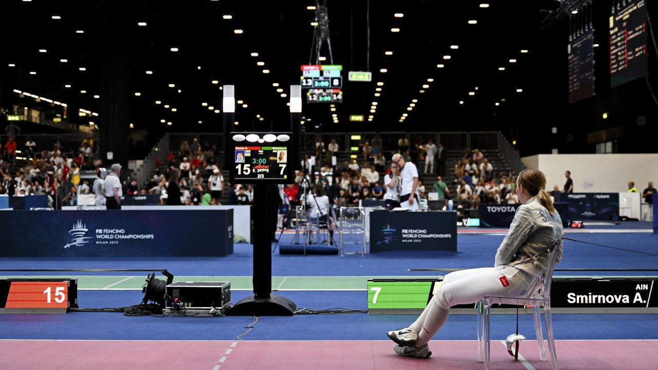 Russian Anna Smirnova remains seated after facing Ukraine's Olga Kharlan.