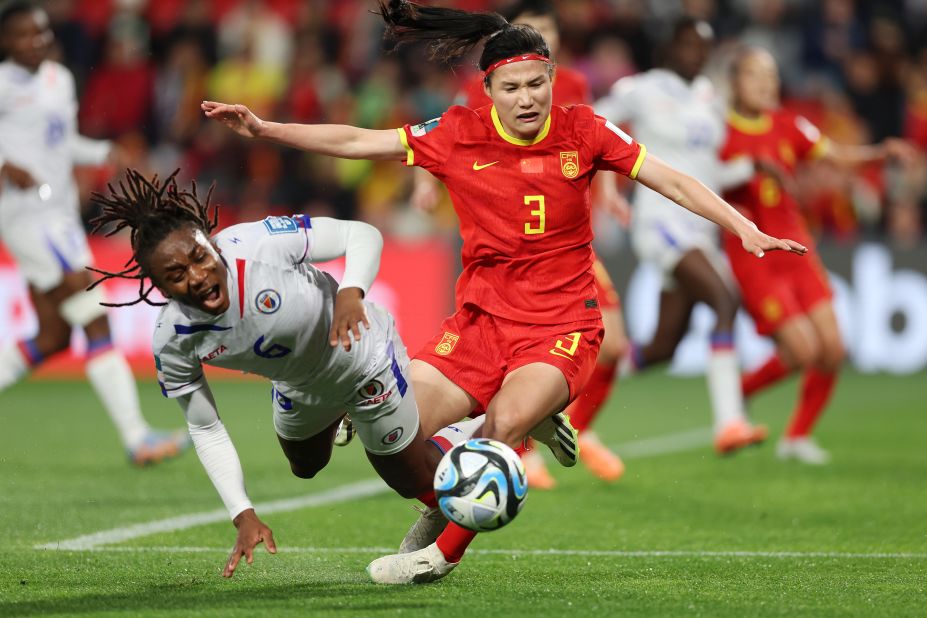 Haiti's Melchie Dumornay, left, collides with China's Dou Jiaxing on July 28.