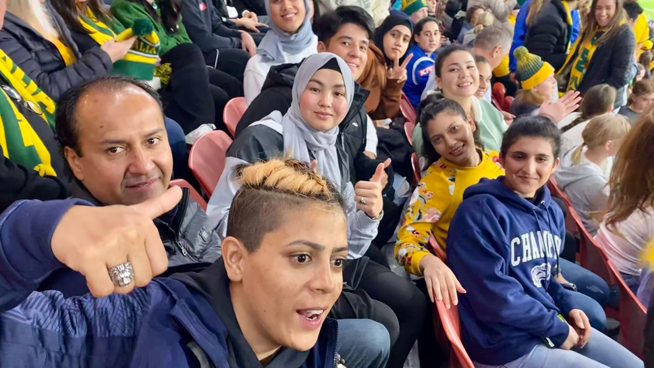 Members of the Afghan national women's team watched Australia take on Nigeria at Brisbane Stadium, on July 27, 2023.