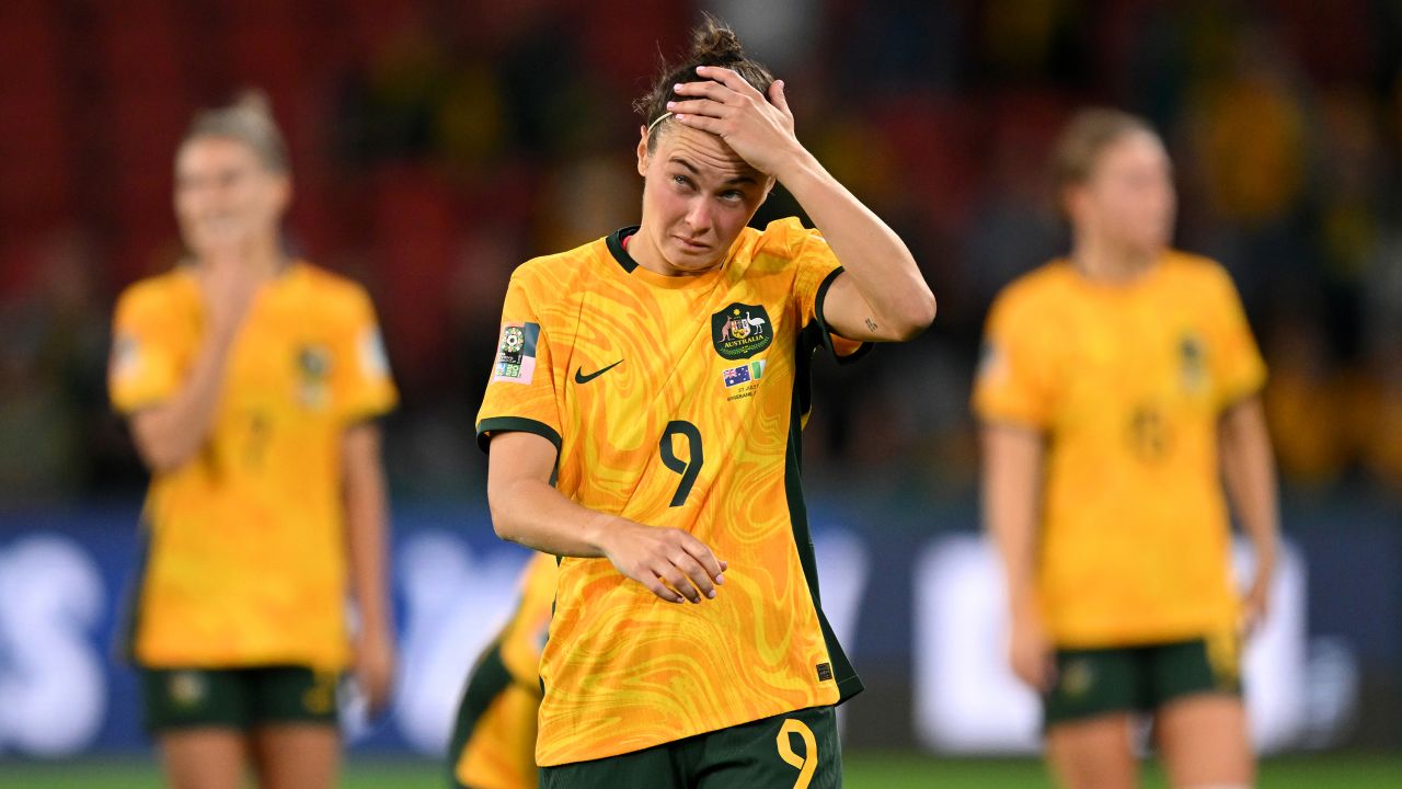 BRISBANE, AUSTRALIA - JULY 27: Caitlin Foord of Australia shows dejection after her team's 2-3 defeat in the FIFA Women's World Cup Australia & New Zealand 2023 Group B match between Australia and Nigeria at Brisbane Stadium on July 27, 2023 in Brisbane, Australia. (Photo by Bradley Kanaris/Getty Images)