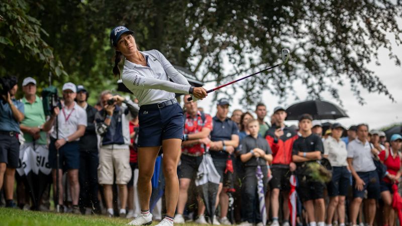 A small town holds its breath as home hero Céline Boutier edges closer to fairytale first major