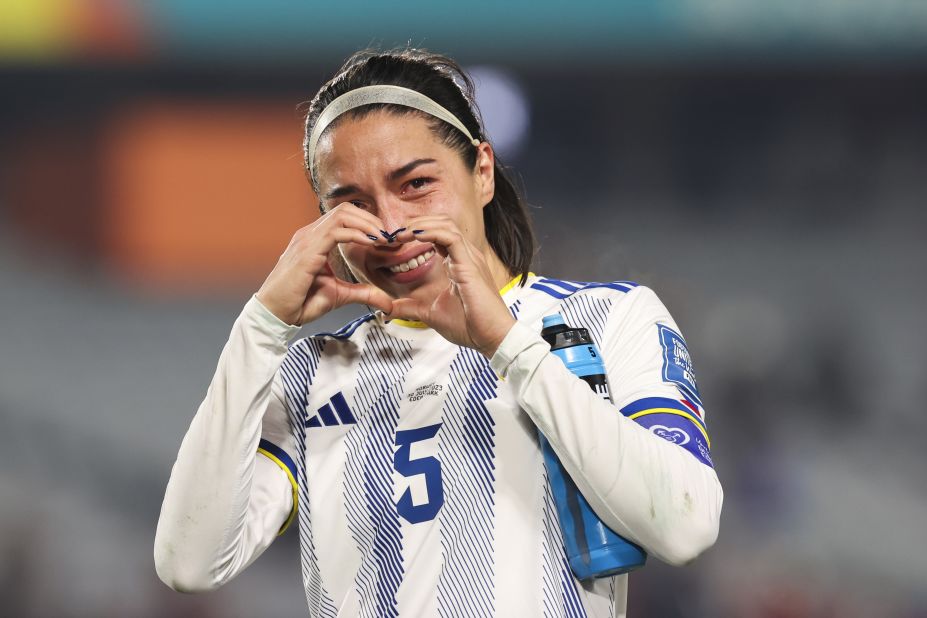 The Philippines' Hali Long makes a heart with her hands at the end of the Norway match.