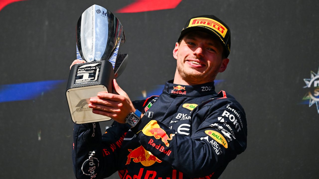 Verstappen celebrates on the podium after winning the Belgian GP.