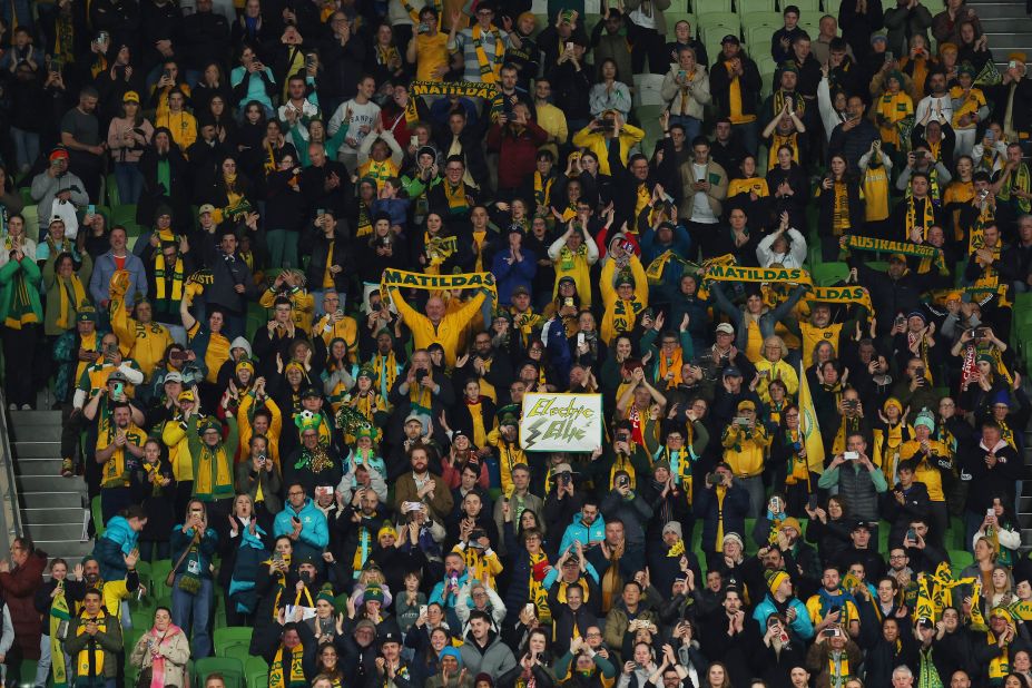 Australia fans in Melbourne celebrate after the Canada match.