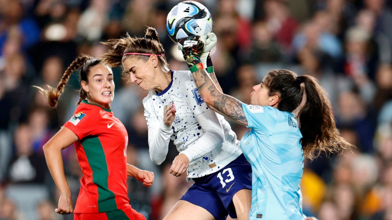 AUCKLAND, NEW ZEALAND - AUGUST 01: Alex Morgan #13 of the United States collides with Inês Pereira #1 of Portugal as they go for the ball during the first half of the FIFA Women's World Cup Australia & New Zealand 2023 Group E match between Portugal and USA at Eden Park on August 01, 2023 in Auckland, New Zealand. (Photo by Carmen Mandato/USSF/Getty Images )