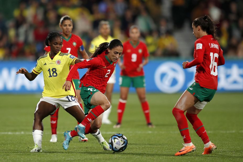 Colombia's teenage star Linda Caicedo, left, challenges Morocco's Zineb Redouani during their final Group H match.