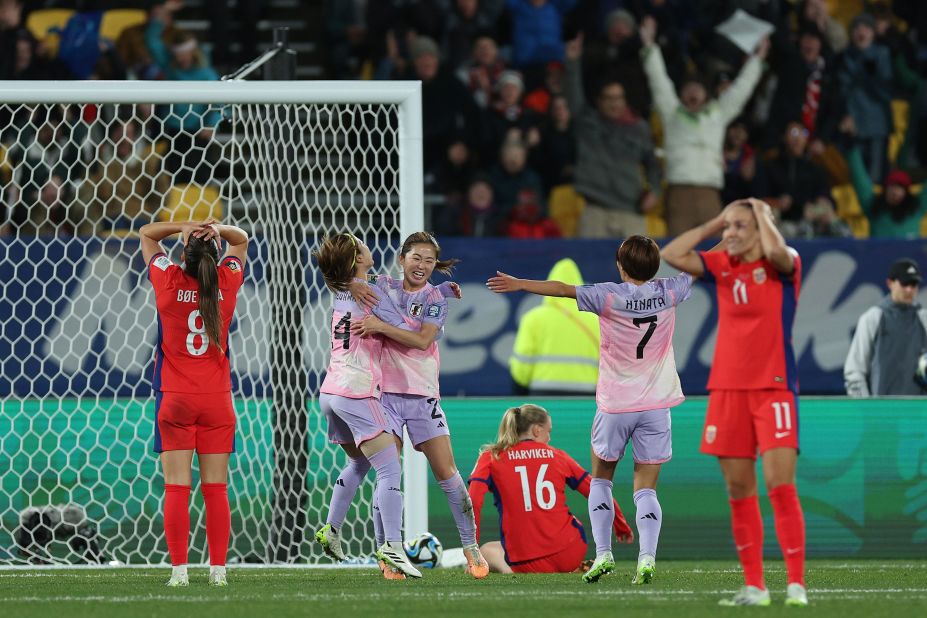 Japan's Risa Shimizu, third from left, celebrates with teammates after scoring in the 3-1 victory over Norway on Saturday, August 5.