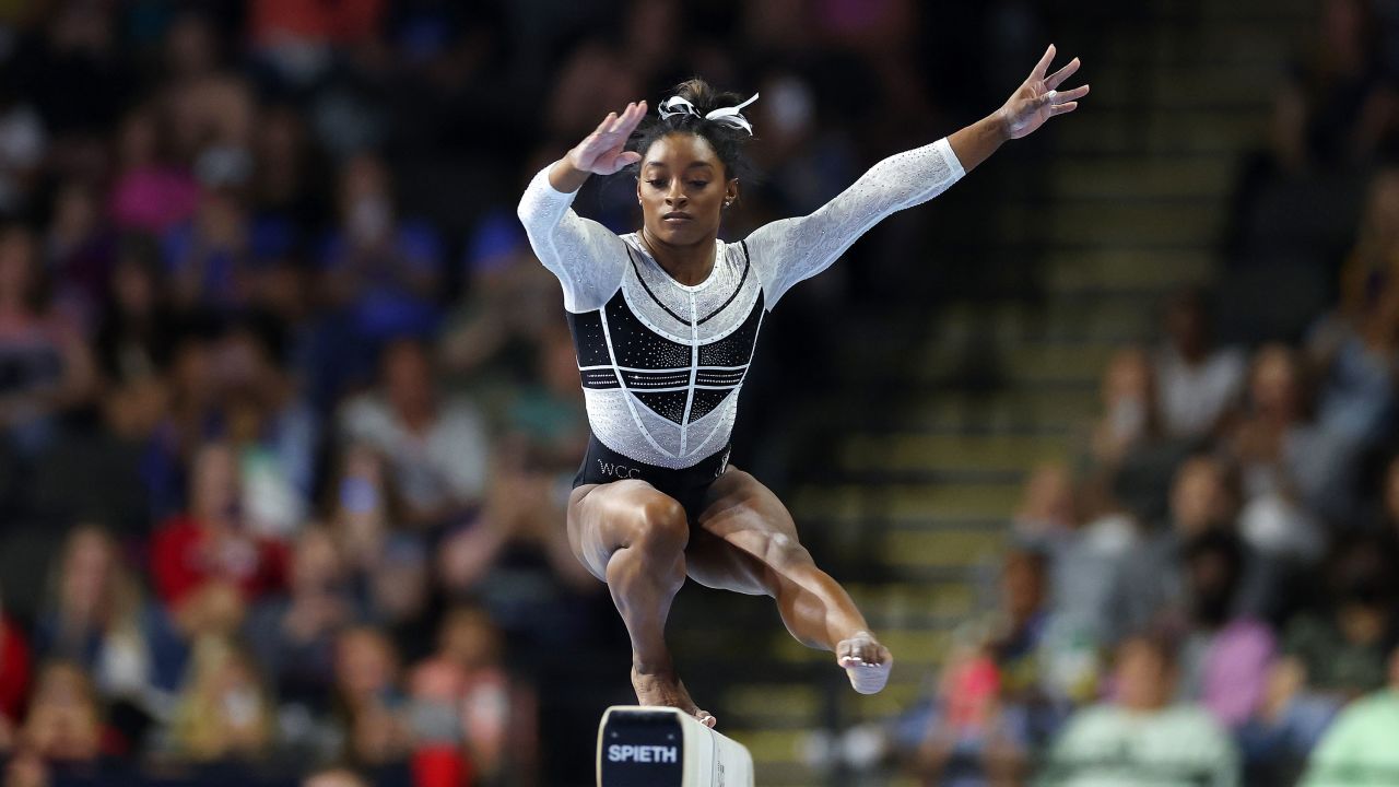 Simone Biles competes on the balance beam.