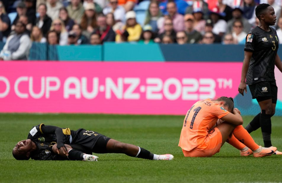 South Africa's Bambanani Mbane grimaces after colliding with Netherlands' Lieke Martens. She was taken away with a stretcher shortly after.