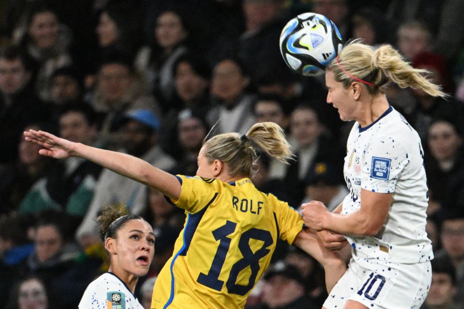 US midfielder Lindsey Horan, right, heads the ball as Sweden forward Fridolina Rolfo challenges during the last-16 tie at Melbourne Rectangular Stadium.