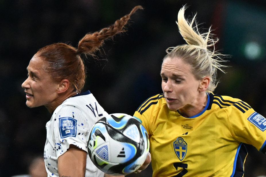 USA's forward Lynn Williams, left, and Sweden's defender Jonna Andersson, right, fight for the ball during the Women's World Cup round of 16 football match between Sweden and USA in Melbourne on Sunday, August 6, 2023.