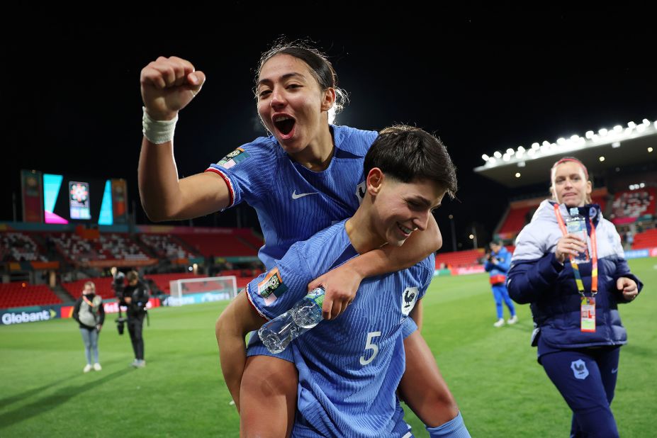 France's Selma Bacha, left, and Élisa De Almeida celebrate on Tuesday, August 8, after a<a href="https://cnn.com/2023/08/07/football/colombia-jamaica-france-morocco-womens-world-cup-spt-intl/index.html" target="_blank"> 4-0 victory against Morocco</a> in the Women's World Cup. France will next play Australia in the quarterfinals.