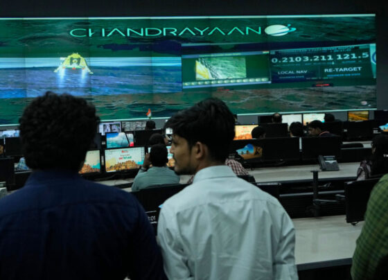 At the Integrated Command Control Centre in Varanasi, India, people look on as the country’s Chandrayaan-3 mission approaches the surface of the moon on August 23.