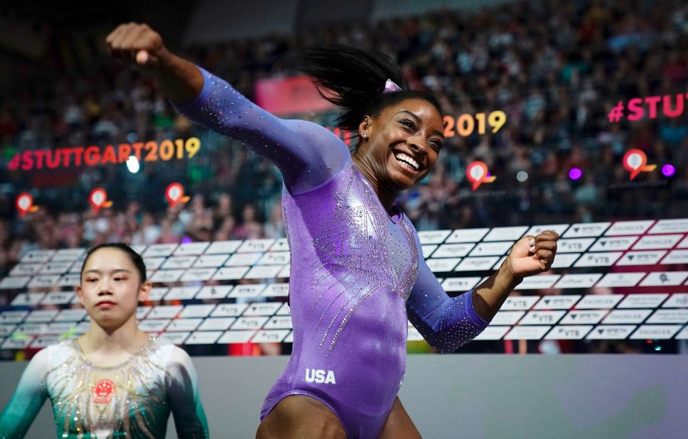 Biles celebrates after winning the balance beam final at the 2019 World Championships.