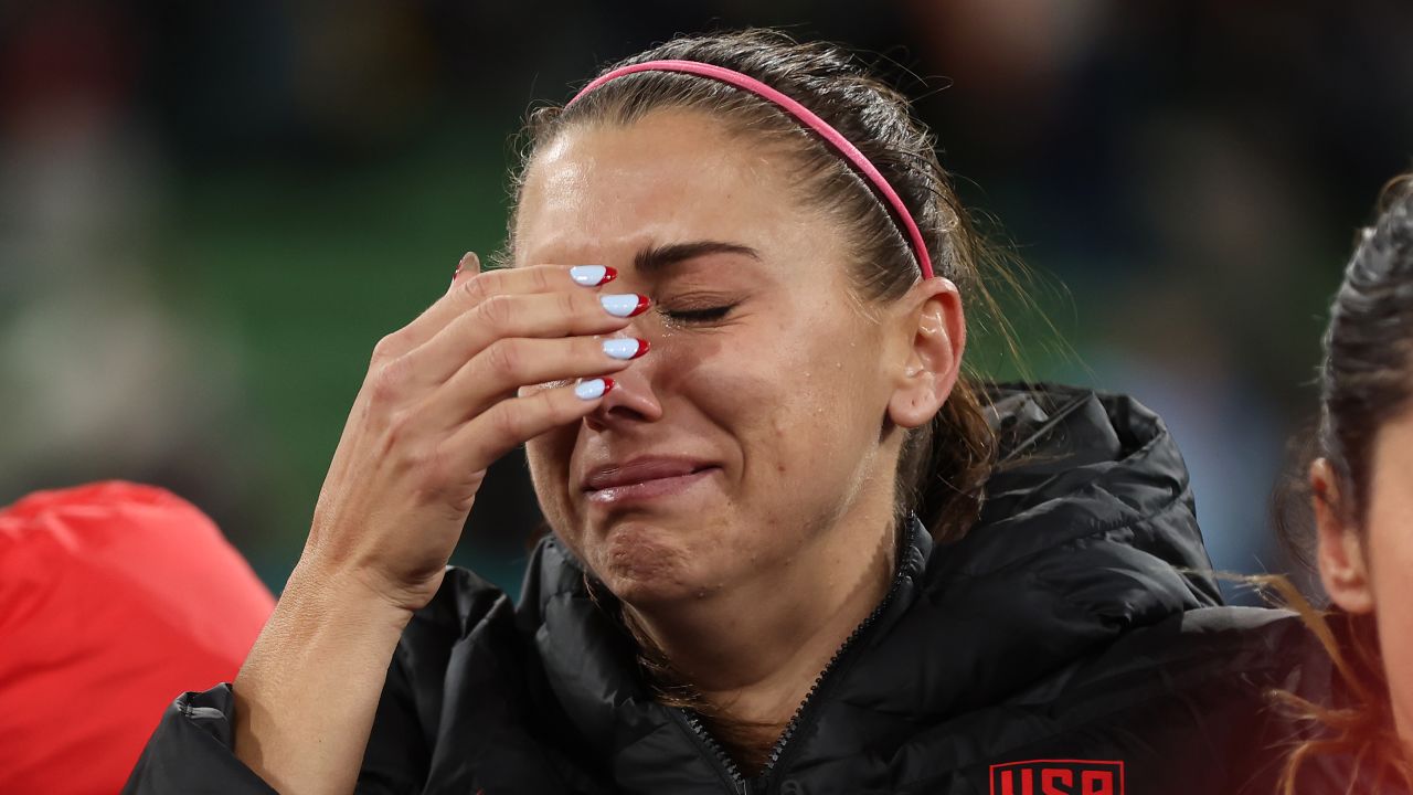 Alex Morgan reacts after the US was knocked out the World Cup.