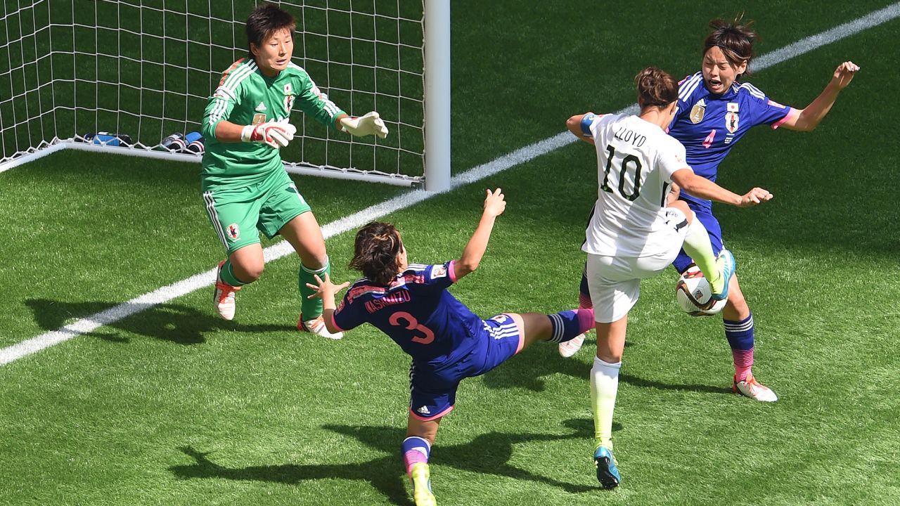 Carli Lloyd (2-R) from the United States scores a goal against Japan's goalkeeper Ayumi Kaihori (L) Azusa Washimizu and Saki Kumagai (R) during the FIFA Women's World Cup 2015 final soccer match between USA and Japan at the BC Place Stadium in Vancouver, Canada, 05 July 2015. Photo by: Carmen Jaspersen/picture-alliance/dpa/AP Images